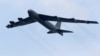 A Boeing B-52 Stratofortress strategic bomber from the United States Air Force (USAF) Andersen Air Force Base in Guam performs a fly-past during an aerial display at the Singapore Airshow in Singapore February 14, 2012. 