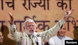 India's Prime Minister Narendra Modi addresses his supporters at Bharatiya Janata Party (BJP) headquarters in New Delhi, India, March 12, 2017.