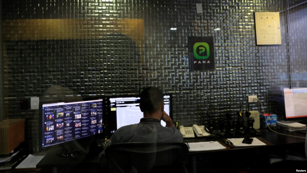 An employee works at the headquarters of Pana, a mobile application which dispatches security crews to stranded drivers who request help, in Caracas, Venezuela, June 15, 2018. 