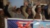 FILE - Pakistani traders protest against U.S. President Donald Trump in Peshawar, Pakistan, Jan 5, 2018.
