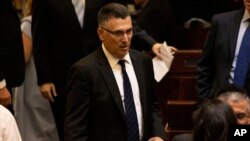 FILE - Likud party member Gideon Saar attends the swearing-in of the new Israeli parliament in Jerusalem, Oct. 3, 2019. 