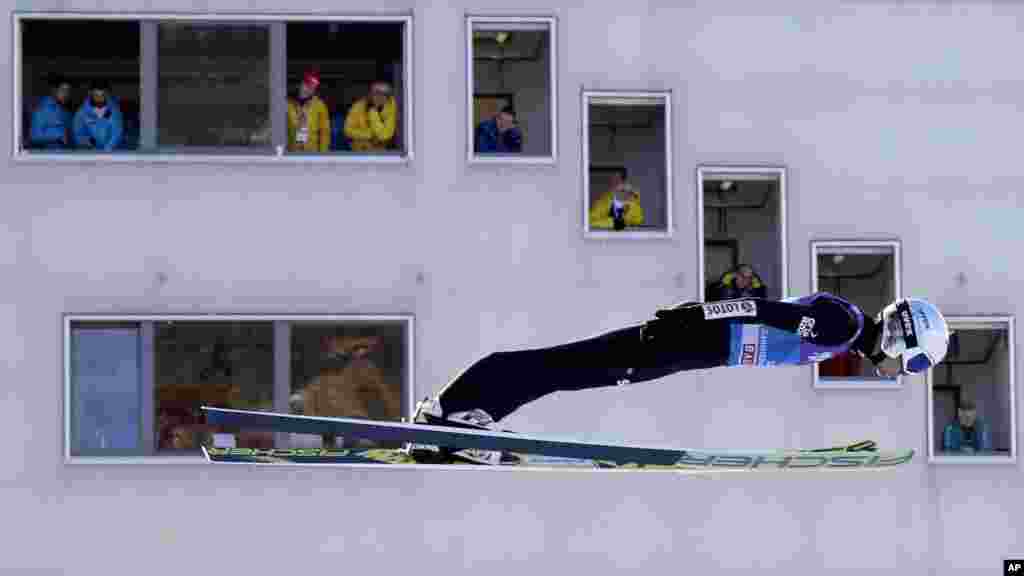 Kamil Stoch of Poland soars past the judges tower at the second stage of the 66th Four Hills ski jumping tournament in Garmisch-Partenkirchen, Germany.