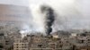 Kurdish Fighters Hold Off Islamic State Advance at Kobani