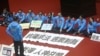 Legislators of the Nationalist Party protest the Anti-infiltration Bill with slogans reading ''Protest against a bad law, Sanction by Votes. Neck Bomb, Be hated by both man and God' on the legislature floor in Taipei, Taiwan, Dec. 31, 2019. 