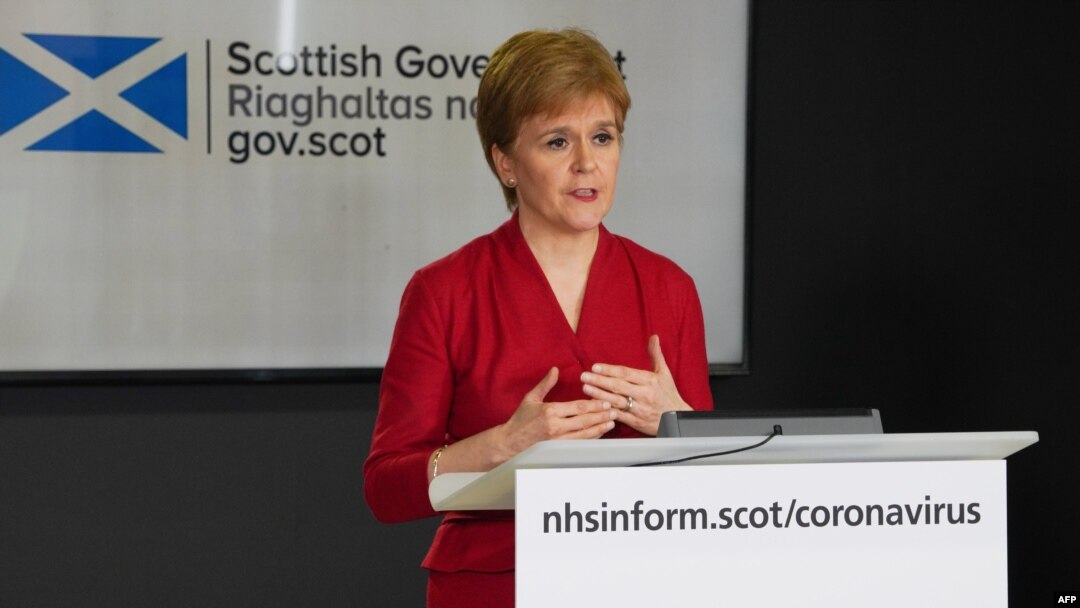 FILE - A handout picture released by the Scottish Government, April 6, 2020, shows Scotland's First Minister Nicola Sturgeon speaking during the daily coronavirus briefing, at St. Andrew's House, Edinburgh.