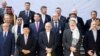 Afghan President Ashraf Ghani poses for a group photo during a peace and security cooperation conference in Kabul, Afghanistan, Feb. 28, 2018.