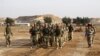 Iraqi tribal fighters take part in a military training to prepare for fighting against Islamic State militants, at the Ain al-Assad military base in Anbar province, Nov. 15, 2014.