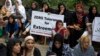 FILE - Pakistanis from Shi'ite community block the main highway in Islamabad, Pakistan, July 22, 2016 while demanding government to provide their community security. 