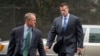 FILE - Former Blackwater Worldwide guard Evan Liberty, right, arrives at federal court in Washington.