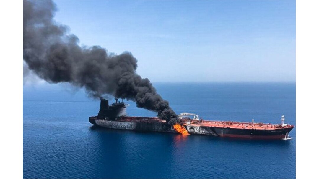 FILE - A picture from Iranian News Agency ISNA, June 13, 2019, reportedly shows fire and smoke billowing from Norwegian owned Front Altair tanker said to have been attacked in the waters of the Gulf of Oman.