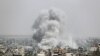 Smoke rises following an Israeli air strike in Gaza, May 5, 2019. 