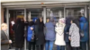Iranian depositors protest a loss of their funds outside a branch of the Caspian Credit Institution in the northern city of Rasht, May 1, 2018.