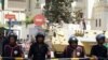 Security forces and tanks stand outside the now vacated Saudi embassy in Cairo, April 29 2012.