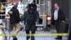 A member of the New York Police Department bomb squad is pictured outside the Time Warner Center in the Manhattan borough of New York City after a suspicious package was found inside the CNN Headquarters in New York, Oct. 24, 2018.