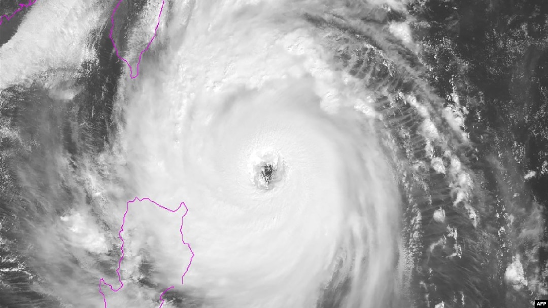 This Himawari satellite image from the National Oceanic and Atmospheric Administration (NOAA) taken and released on October 30, 2024 shows typhoon Kong-rey as it develops over the West Pacific.
