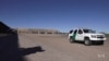 Border Town View of US Troops and Caravan