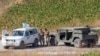 FILE - Lebanese soldiers with U.N officials patrol in the southern Lebanese village of Aitaroun along the Israel-Lebanon border, Israel, Aug. 27, 2019. 