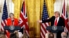 British Prime Minister Theresa May listens as U.S. President Donald Trump speaks during their joint news conference at the White House in Washington, Jan. 27, 2017. 