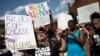 Protestors rally during a Black Lives Matter demonstration, July 10, 2016, in Cincinnati. More than a thousand protested against the shootings of black men by police officers. 