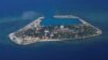 FILE - An aerial view of Southwest Cay, also known as Pugad Island, controlled by Vietnam and part of the Spratly Islands in the disputed South China Sea, April 21, 2017.