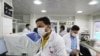 FILE - Medical staff wear face masks at a hospital amid concerns of the spread of the coronavirus disease (COVID-19) in Sana'a, Yemen, March 17, 2020. 
