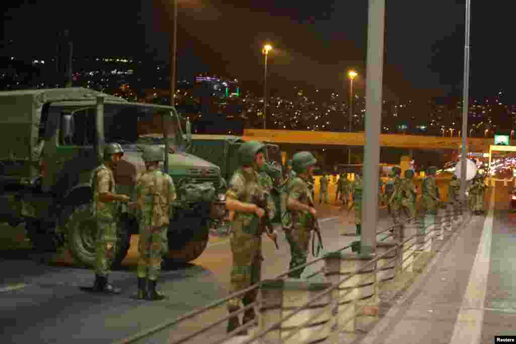 Turkish military block access to the Bosphorus bridge, which links the city's European and Asian sides, in Istanbul, Turkey, July 15, 2016.