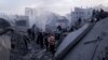 Palestinians gather at the site of an Israeli strike on houses in Gaza City on Jan. 4, 2025.