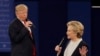 Republican presidential nominee Donald Trump and Democratic presidential nominee Hillary Clinton speak during the second presidential debate at Washington University in St. Louis, Sunday, Oct. 9, 2016. 