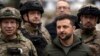 Президент України Володимир Зеленський під час візиту до звільненого ЗСУ Ізюма, 14 вересня 2022 (AP Foto/Leo Correa)