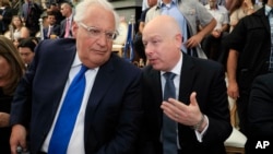 U.S. Ambassador to Israel David Friedman, left, and White House Mideast envoy Jason Greenblatt attend the opening of an ancient road at the City of David, a popular archaeological and tourist site in the Palestinian neighborhood of Silwan in east Jerusale