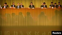 FILE - Chinese President Xi Jinping (C) speaks during an event to commemorate the 40th anniversary of the "Message to Compatriots in Taiwan" at the Great Hall of the People in Beijing, Jan. 2, 2019.
