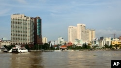 In this Sept. 23, 2009 photo, a riverside view of Ho Chi Minh city center that is located along the Saigon River in Vietnam is shown. 