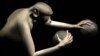 Large-scale brain activity from a rhesus monkey was decoded and used to simultaneously control reaching movements of both arms of a virtual monkey avatar towards spherical objects in virtual reality. Photo: Duke Center for Neuroengineering