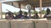 Members of self-defense groups on are seen on duty in Mora, Cameroon. (M.E. Kindzeka/VOA)