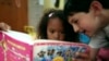 Students read a Chinese book at Broadway Elementary, a school in the Los Angeles district that started a Mandarin-immersion program in September 2010.