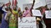 Supporters of Muttahida Qaumi Movement-Pakistan, a political party, protest the results of the recently concluded general elections, Aug. 2, 2018. The protesters demanded the resignation of the chief election commissioner and raised concerns regarding the transparency of the election. Placard at bottom reads "rigging is unacceptable." 