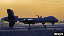FILE - A MQ-9 Reaper drone taxis at Kandahar Airfield, Afghanistan, Dec. 27, 2009. MQ-9 Reaper drones are reportedly armed with Hellfire missiles, laser-guided bombs and other munitions.