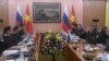 FILE - Vietnamese Defense Minister Ngo Xuan Lich (2nd L) talks to his Russian counterpart Sergei Shoigu (2nd R) during their meeting at the Ministry of Defense in Hanoi, Vietnam, Jan. 23, 2018. 