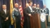 Assistant U.S. Attorney Gilmore Childers outlines the way the international car theft and export ring worked during a press conference in Newark, May 23, 2012. (Adam Phillips/VOA)
