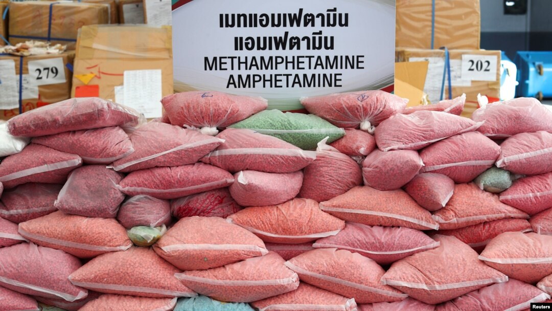 FILE - Bags of methamphetamine pills are pictured during the 50th Destruction of Confiscated Narcotics ceremony in Ayutthaya province, Thailand, June 26, 2020.