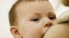 FILE - Breastfeeding