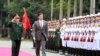 U.S. Defense Secretary Mark Esper, center, and Vietnamese Defense Minister Ngo Xuan Lich review an honor guard in Hanoi, Vietnam, Nov. 20, 2019.