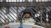 FILE - A Pakistani paramilitary soldier guards a special court. 