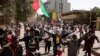 Thousands of people take to the streets in Khartoum, Sudan, Jan. 17, 2022, to protest the Oct. 25, 2021 coup that has plunged the country into grinding deadlock.