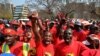 Striking petrol station attendants protest in Johannesburg, South Africa, September 9, 2013.