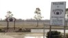 File - Signs welcome visitors to the private North Carolina-based security company Blackwater USA's headquarters near Moyock, North Carolina.