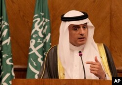 FILE - Saudi Foreign Minister Adel al-Jubeir speaks during a press conference in Amman, Jordan July 9, 2015.