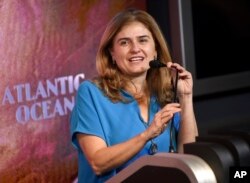 Director of communications for UNICEF, Paloma Escudero, speaks at a lighting ceremony at the Empire State Building in honor of UNICEF's World Children's Day, Nov. 20, 2018, in New York.