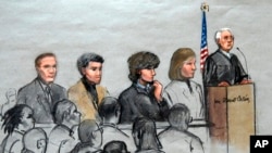 In this courtroom sketch, Boston Marathon bombing suspect Dzhokhar Tsarnaev, third from right, is depicted with his lawyers and U.S. District Judge George O'Toole at the federal courthouse in Boston Jan. 6, 2015.
