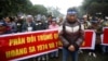 FILE - People take part in an anti-China protest to mark the 43rd anniversary of the China's occupation of the Paracel Islands in the South China Sea in Hanoi, Vietnam, Jan. 19, 2017.